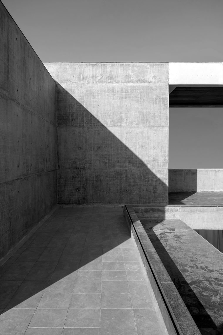 Concrete architecture in raking sunlight